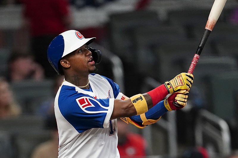 AP photo by John Bazemore / Atlanta Braves right fielder Ronald Acuña Jr. follows through on his go-ahead two-run homer in the fifth inning of Friday night's 8-1 win against the Philadelphia Phillies.