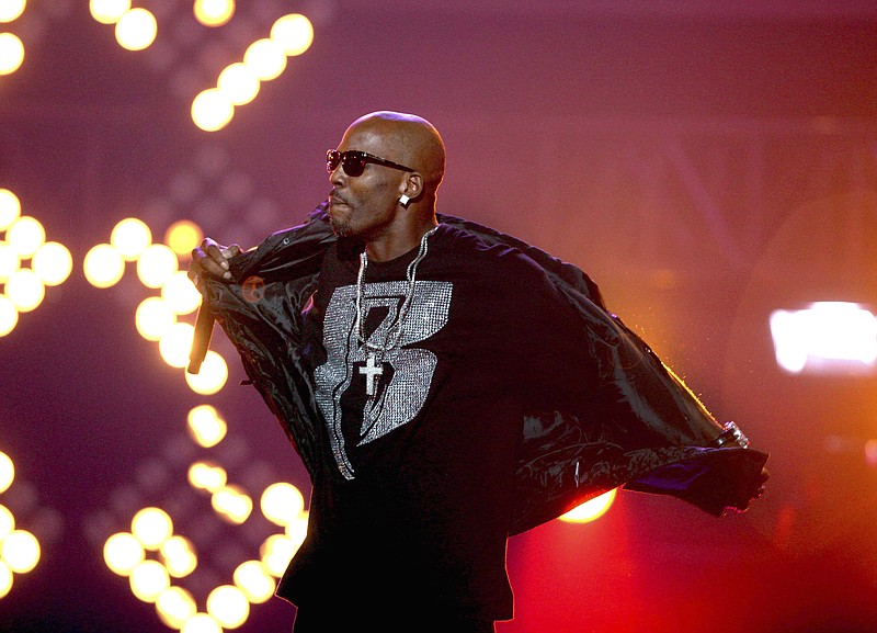 DMX performs during the BET Hip Hop Awards in Atlanta on Oct. 1, 2011. The family of rapper DMX says he has died at age 50 after a career in which he delivered iconic hip-hop songs such as "Ruff Ryders' Anthem." A statement from the family says the Grammy-nominated rapper died at a hospital in White Plains, New York, "with his family by his side after being placed on life support for the past few days. He was rushed to a New York hospital from his home April 2. (AP Photo/David Goldman, File)