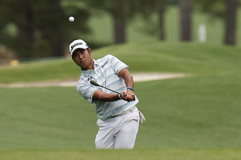 AP photo by Gregory Bull / Hideki Matsuyama hits to the third green during the third round of the Masters on Saturday in Augusta, Ga. Matsuyama shot a 65 to take a four-stroke lead into the final round and is trying to become Japan's first major champion in men's golf.