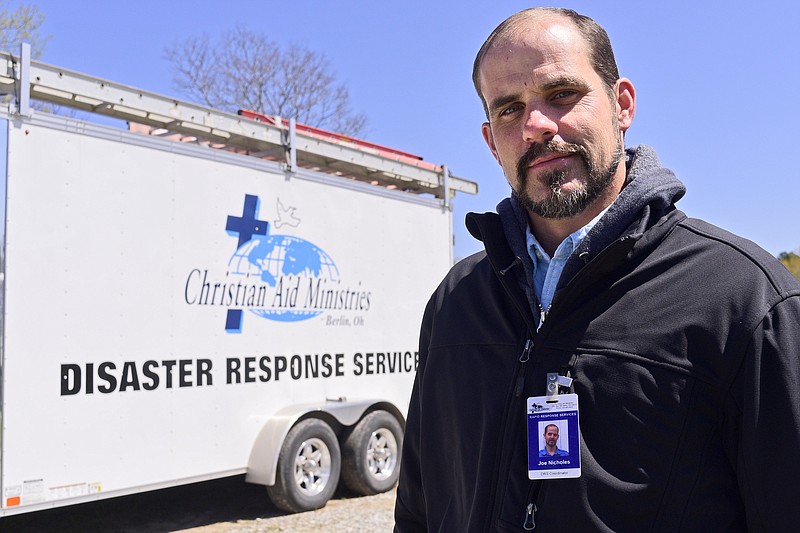 Staff Photo by Robin Rudd / Christian Aid Ministries Disaster Response Service coordinator Joe Nicholes poses for a portrait at the ministries camp beside Shelter Church on East Brainerd Road on April 2, 2021.