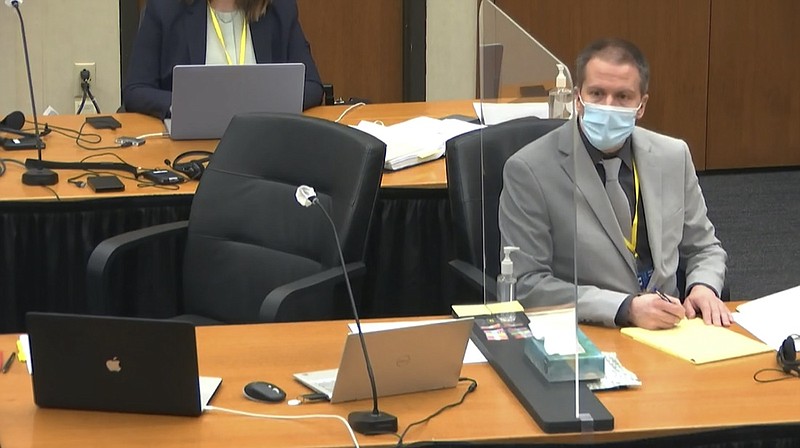 In this image from video, defendant, former Minneapolis police Officer Derek Chauvin, listens as Hennepin County Judge Peter Cahill presides Friday, April 9, 2021, at the Hennepin County Courthouse in Minneapolis, Minn. Chauvin is charged in the May 25, 2020 death of George Floyd. (Court TV via AP, Pool)