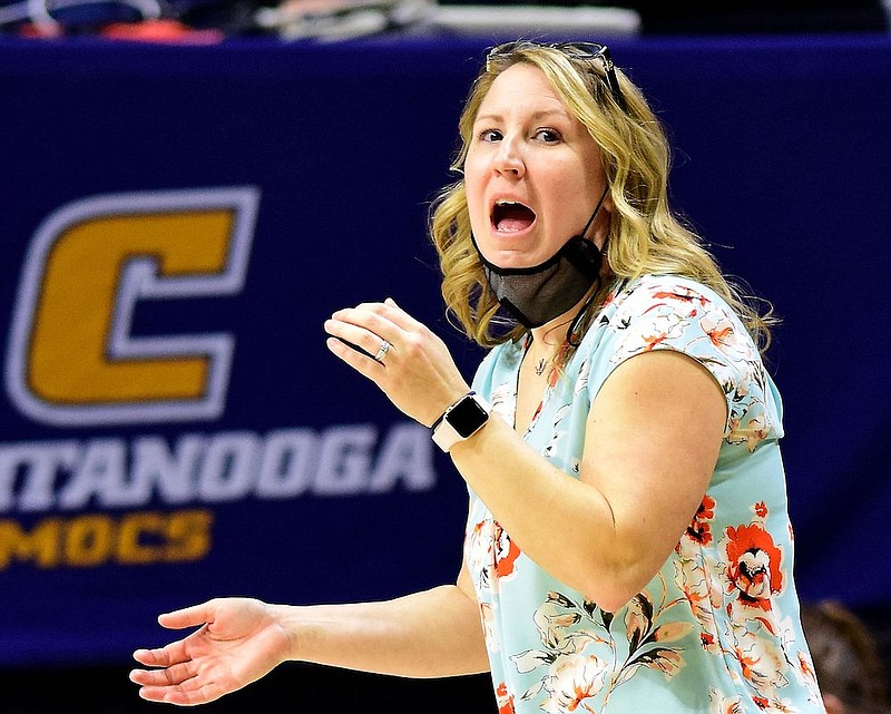 Staff Photo by Robin Rudd / University of Tennessee at Chattanooga women's basketball team head coach Katie Burrows instructs the Mocs. The UTC Mocs hosted the University of North Carolina at Greensboro Spartans in women's Southern Conference basketball at McKenzie Arena on Feb. 19, 2021.