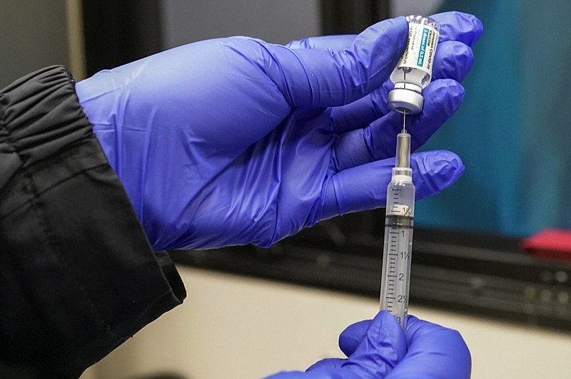 FILE — In this March 31, 2021, file photo, a nurse fills a syringe with Johnson & Johnson's one-dose COVID-19 vaccine at the Vaxmobile, at the Uniondale Hempstead Senior Center, in Uniondale, N.Y. (AP Photo/Mary Altaffer, File)


