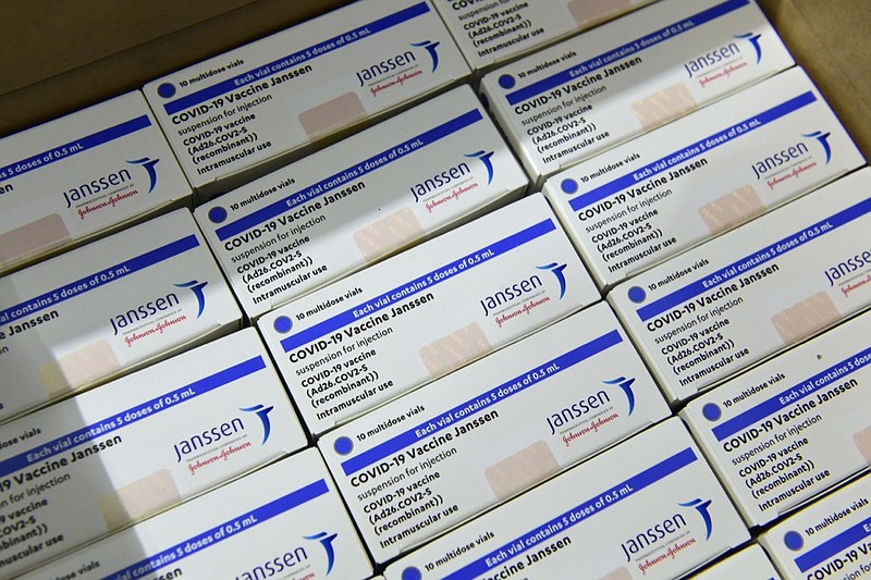 Boxes of Janssen vaccines sit at a warehouse of Hungaropharma, a Hungarian pharmaceutical wholesale company, in Budapest, Hungary, after the arrival of the first batch of the Johnson & Johnson, US, made one-dose vaccine against the new coronavirus in the country Tuesday, April 13, 2021. The first shopment contains 28 thousand doses of Janssen. (Szilard Koszticsak/MTI via AP)