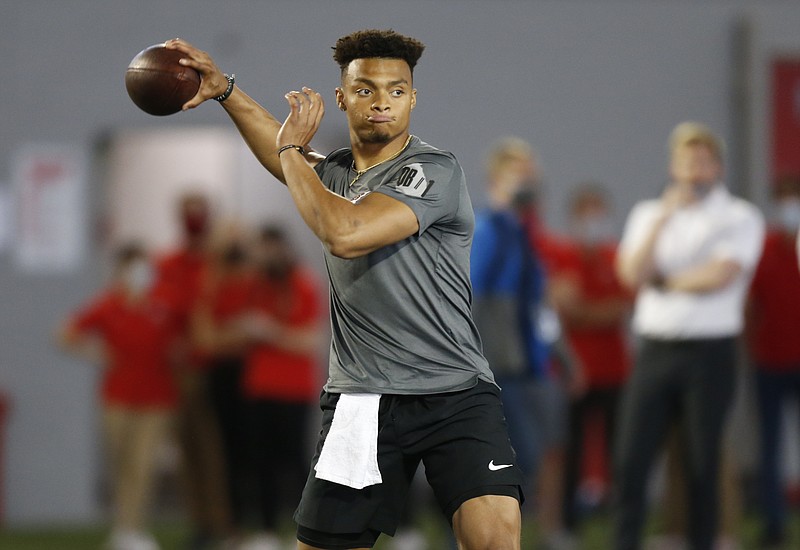 AP file photo by Paul Vernon / Ohio State quarterback Justin Fields, who began his college football career in his home state with the Georgia Bulldogs, throws during the Buckeyes' pro day on March 30 in Columbus.