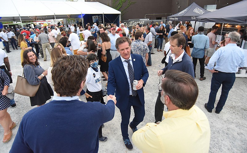 Staff Photo By Matt Hamilton / Mayor-Elect Tim Kelly greets supporters at the Chattanooga Brewing Co. on Tuesday.