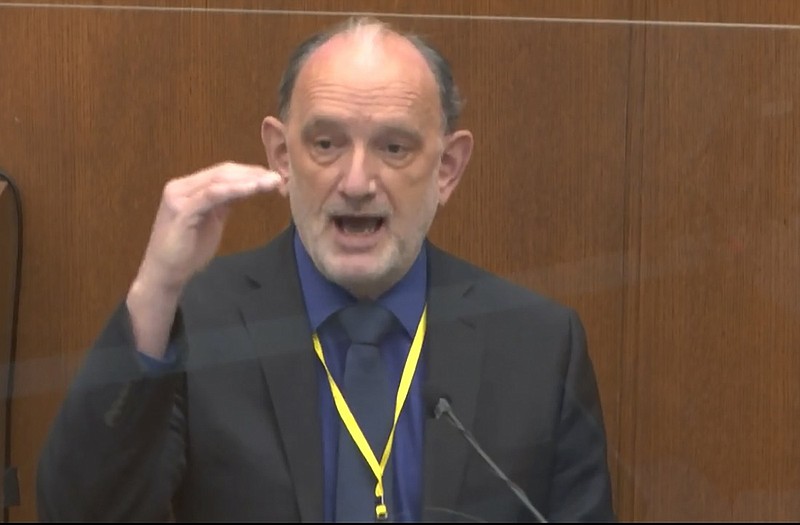 In this image from video, Dr. David Fowler testifies as Hennepin County Judge Peter Cahill presides, Wednesday, April 14, 2021, in the trial of former Minneapolis police Officer Derek Chauvin at the Hennepin County Courthouse in Minneapolis, Minn. Chauvin is charged in the May 25, 2020 death of George Floyd. (Court TV via AP, Pool)