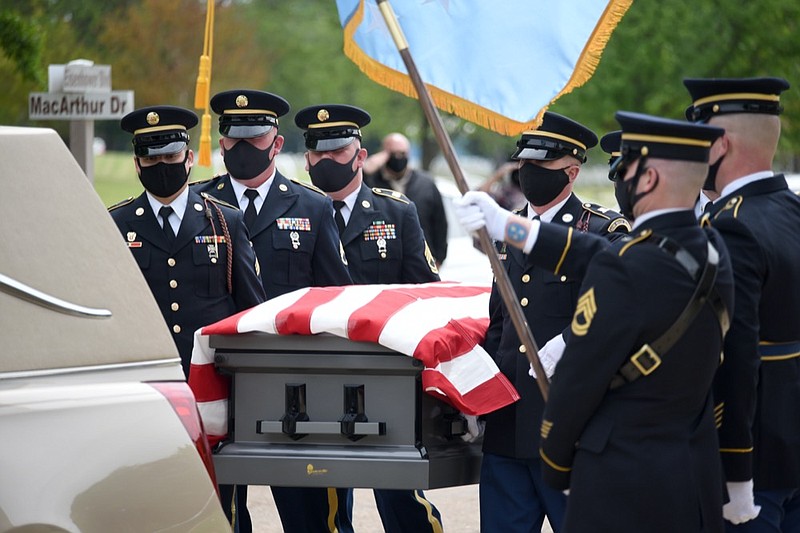 Staff Photo by Matt Hamilton / Members of the Honor Guard carry the casket of World War II Medal of Honor recipient Charles H. Coolidge to the pavilion at the Chattanooga National Cemetery on Friday, April 16, 2021.
