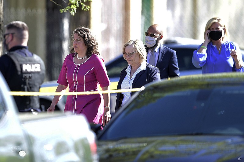 Associated Press photo by Calvin Mattheis / Knoxville Mayor Indya Kincannon, left, arrives at the scene of a police shooting at Austin-East High School on Monday, April 12, 2021.