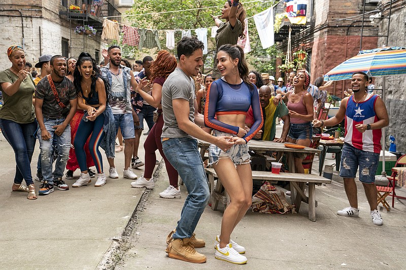 This image released by Warner Bros. Picures shows a scene from the upcoming film "In the Heights," which will open the Tribeca Film Festival in June. (Macall Polay/Warner Bros. Entertainment via AP)


