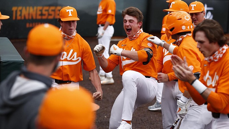 Tennessee Athletics photo by Andrew Ferguson / Tennessee baseball players celebrate during Saturday's 8-4 victory over Vanderbilt that squared the series of top-five teams at one game apiece.