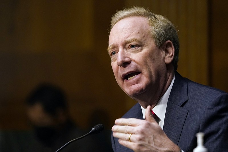 FILE - In this Feb. 23, 2021, file photo Brad Smith, president of Microsoft Corporation, speaks on Capitol Hill in Washington during a hearing on emerging technologies and their impact on national security. Federal lawmakers are insisting Microsoft swiftly upgrade security to what they say it should have provided in the first place _ and without fleecing taxpayers. (AP Photo/Susan Walsh, File)


