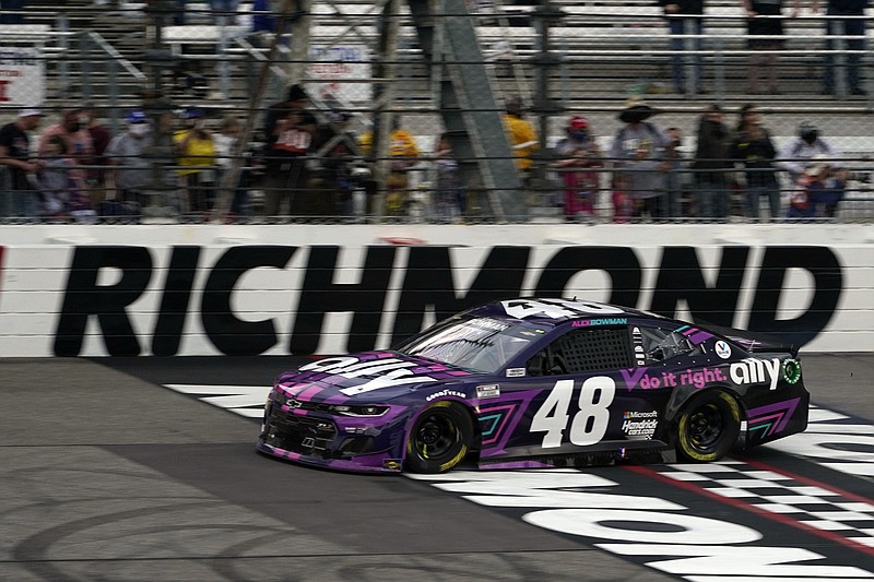 AP photo by Steve Helber / Alex Bowman cosses the finish line in the Hendrick Motorsports No. 48 Chevrolet to win Sunday's NASCAR Cup Series race in Richmond, Va.