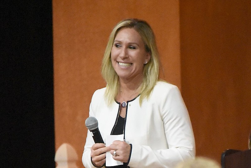 Staff Photo by Matt Hamilton / Rep. Marjorie Taylor Greene receives applause after speaking at a town hall event in Dalton on Wednesday, Jan. 27, 2021.