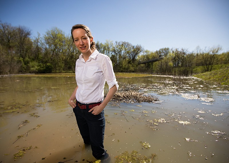 Staff photo by Troy Stolt / Clea Klagstad stands in one of the wetland areas at Renaissance Park on the North Shore.