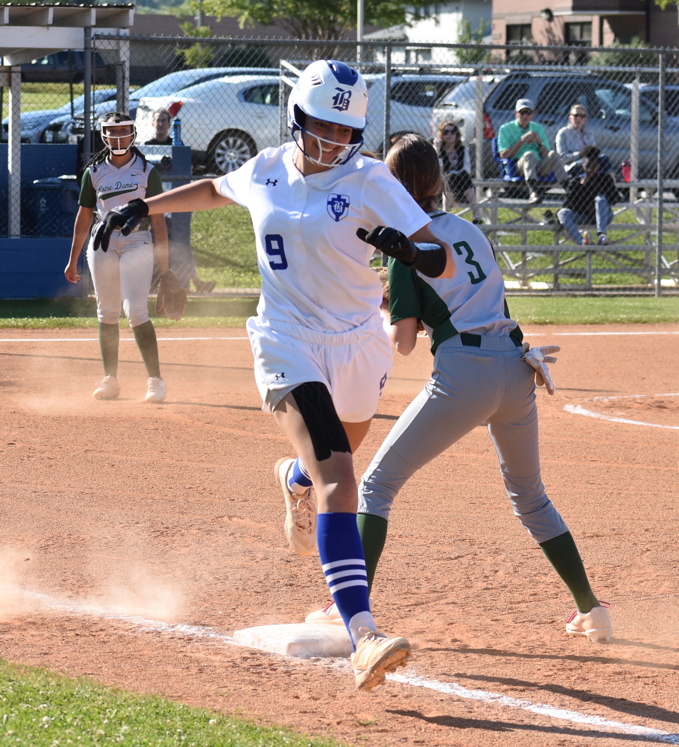 Staff photo by Patrick MacCoon / Boyd Buchanan's Presley Williamson runs through the first base bag on a sacrifice bunt in Tuesday's home win over Notre Dame.