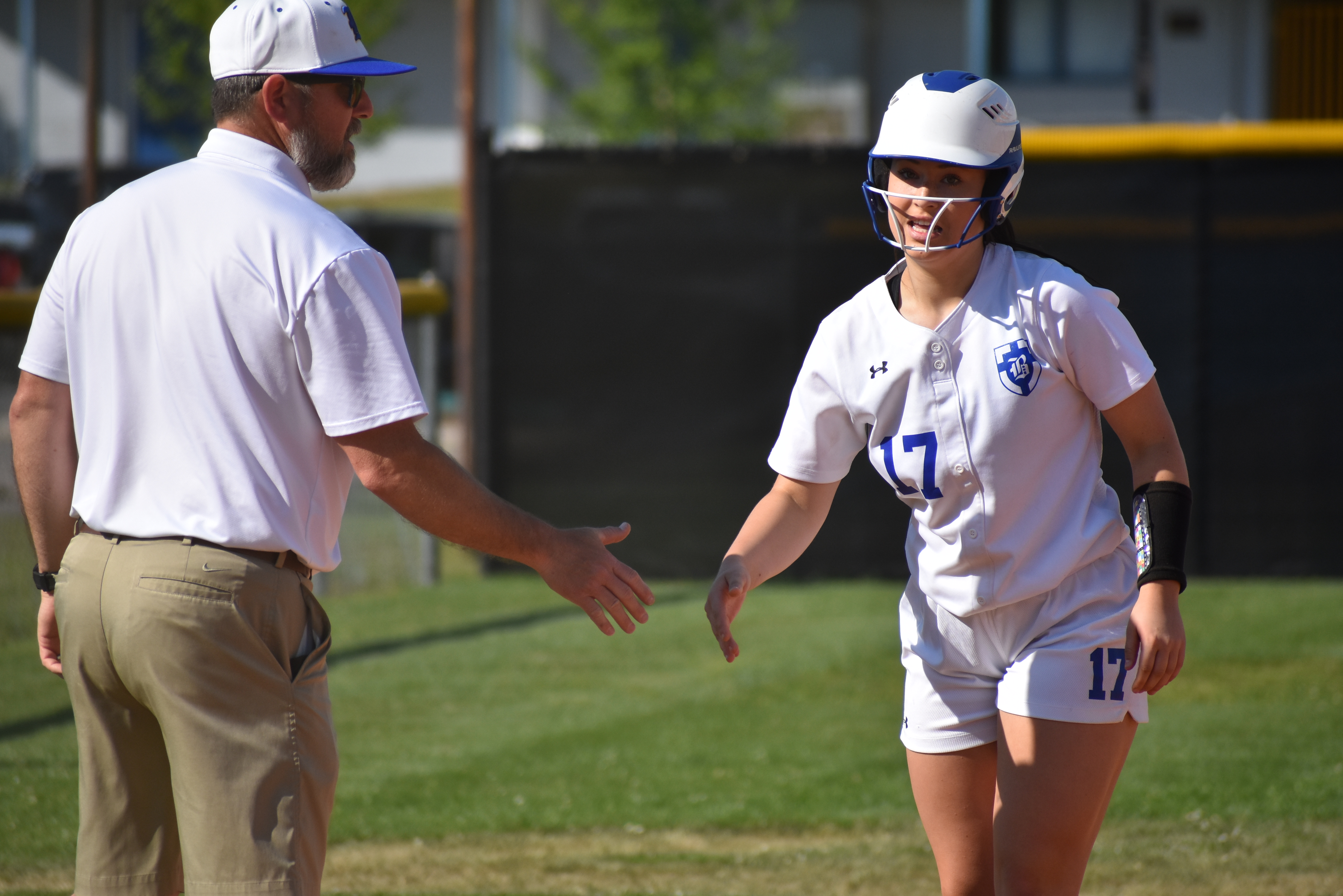 Staff photo by Patrick MacCoon / Boyd Buchanan coach Jeff Stone high fives Izzy Messer during a home victory over Notre Dame.