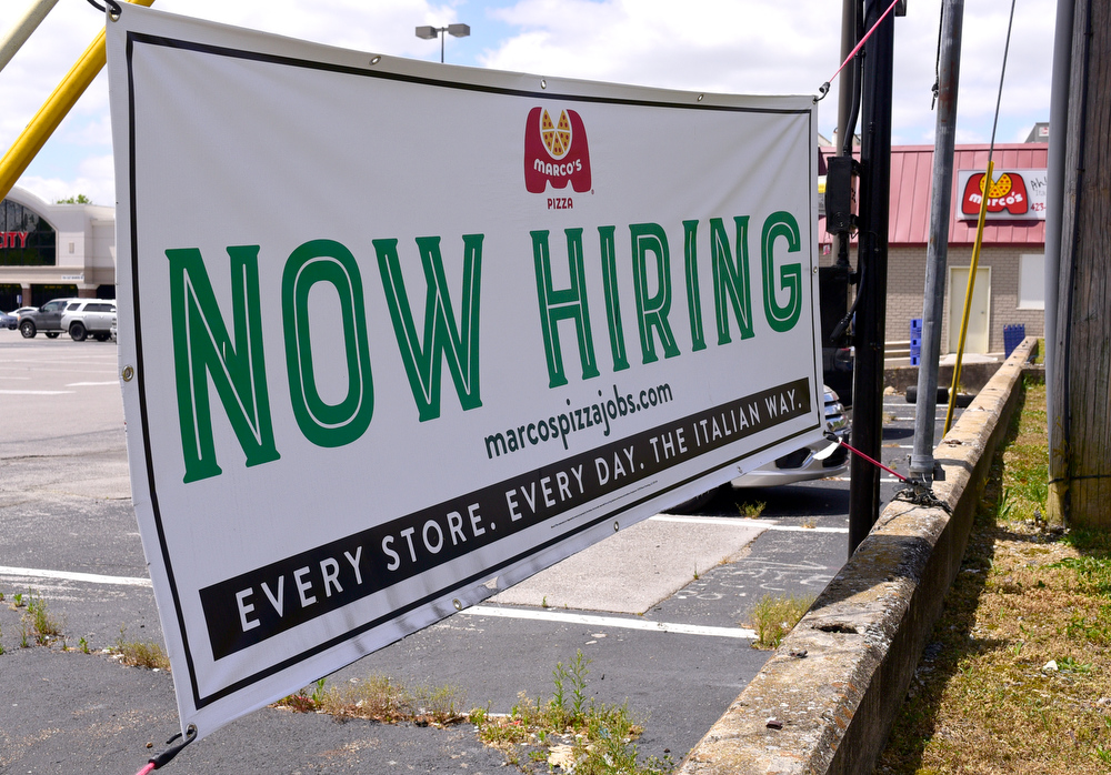 Staff Photo by Robin Rudd / The Marco's Pizza in East Brainerd has a help wanted sign out front. Employers in the Chattanooga area are having a difficult time attracting workers to entry level jobs.