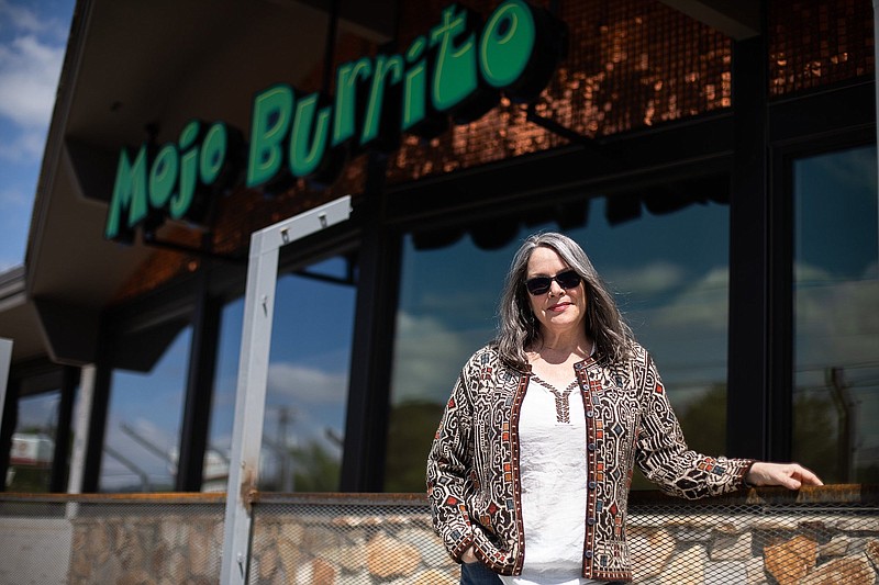 Staff photo by Troy Stolt / Mojo Burrito owner Eve Williams stands for a portrait at 3512 Dayton Blvd., a location that has not opened for business yet, on Wednesday, April 21, 2021 in Chattanooga, Tenn. Williams said she is unsure when the Dayton Blvd. franchise will open its doors, adding that a lot will depend on finding employees to work there.