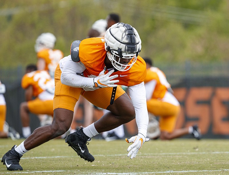 Tennessee Athletics photo by Kate Luffman / Tennessee outside linebacker Byron Young goes through a practice drill on Haslam Field.