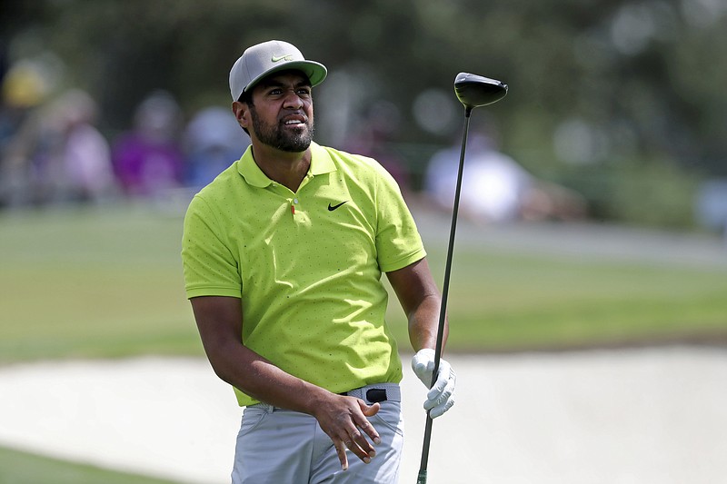 Tony Finau tees off on the third hole during the final round of the Masters golf tournament at Augusta National, Sunday, April 11, 2021, in Augusta, Ga. (Curtis Compton/Atlanta Journal-Constitution via AP)