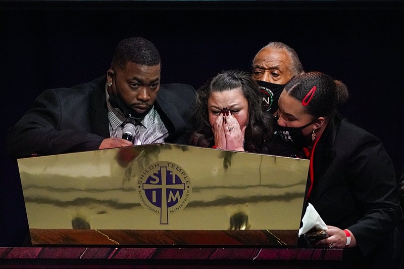 Katie and Aubrey Wright, parents of Daunte Wright, cry as the speak during funeral services of Daunte Wright at Shiloh Temple International Ministries in Minneapolis, Thursday, April 22, 2021. (AP Photo/Julio Cortez, Pool)


