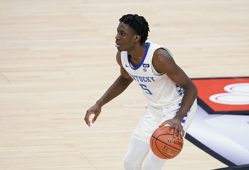 FILE - In this Dec. 1, 2020, file photo, Kentucky's Terrence Clarke brings the ball up during the second half of the team's NCAA college basketball game against Kansas in Indianapolis. (AP Photo/Darron Cummings, File)


