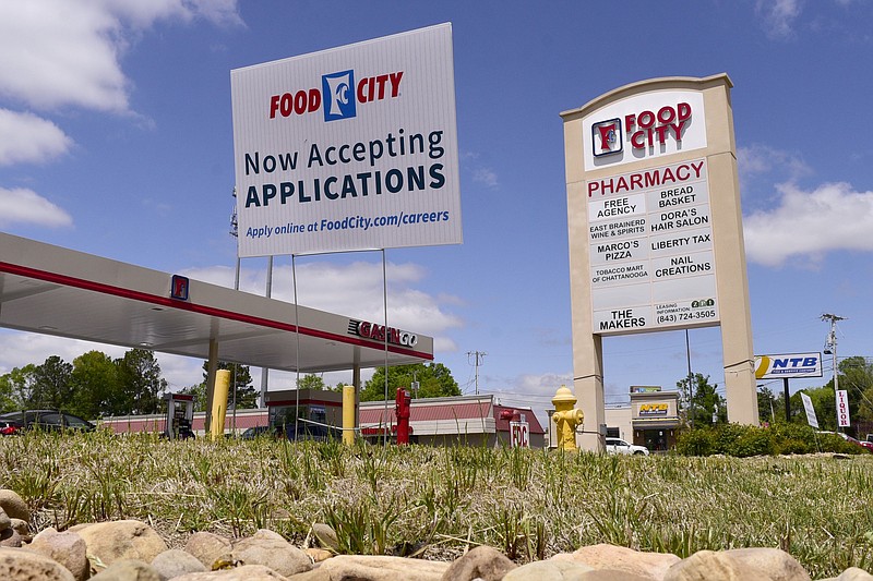 Staff Photo by Robin Rudd / The Food City, in East Brainerd, has a help wanted sign out front. Employers, in the Chattanooga area, are having a difficult time attracting workers to entry level jobs.