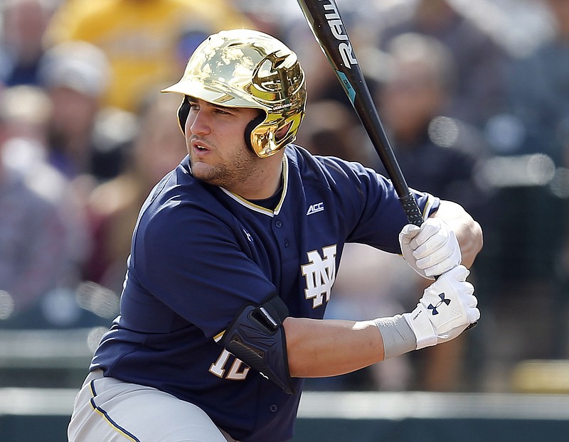 FILE - In this Feb. 17, 2019, file photo, Notre Dame Niko Kavadas waits to hit during an NCAA college baseball game against Arizona State in Phoenix. Notre Dame and Pittsburgh were picked last in their divisions in the Atlantic Coast Conference. Both are ranked in the top 25 nationally and appear headed for appearances in the NCAA Tournament. (AP Photo/Rick Scuteri, File)