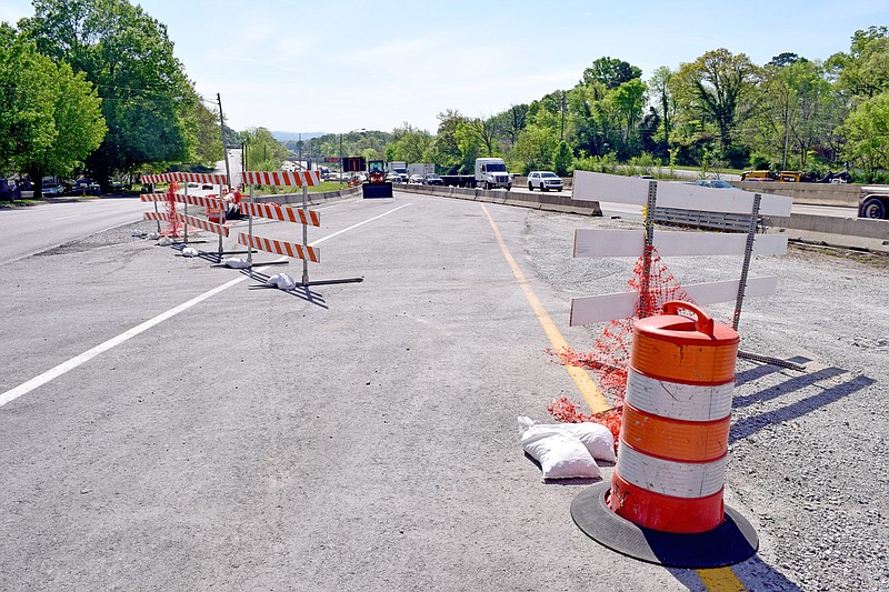 Staff file photo by Robin Rudd / This temporary ramp will allow northbound traffic on Interstate 24 to exit onto North Terrace, at left, to bypass the work on the bridge over Germantown Road. Traffic will again merge onto the interstate past Germantown.