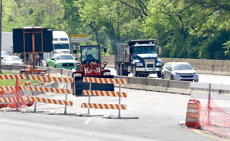 Staff file photo by Robin Rudd / This temporary ramp will allow northbound traffic on Interstate 24 to exit onto North Terrace, foreground, to bypass the work on the bridge over Germantown Road. Traffic will again merge onto the interstate past Germantown.