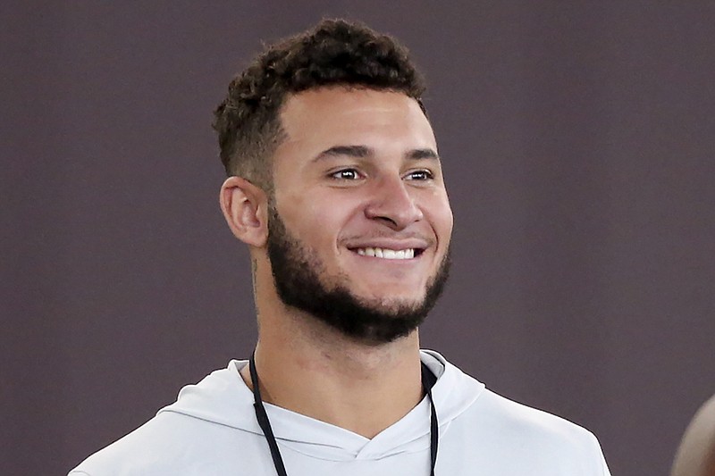 AP photo by Matt Gentry / Virginia Tech cornerback Caleb Farley smiles during the Hokies' pro day on March 26 in Blacksburg, Va.