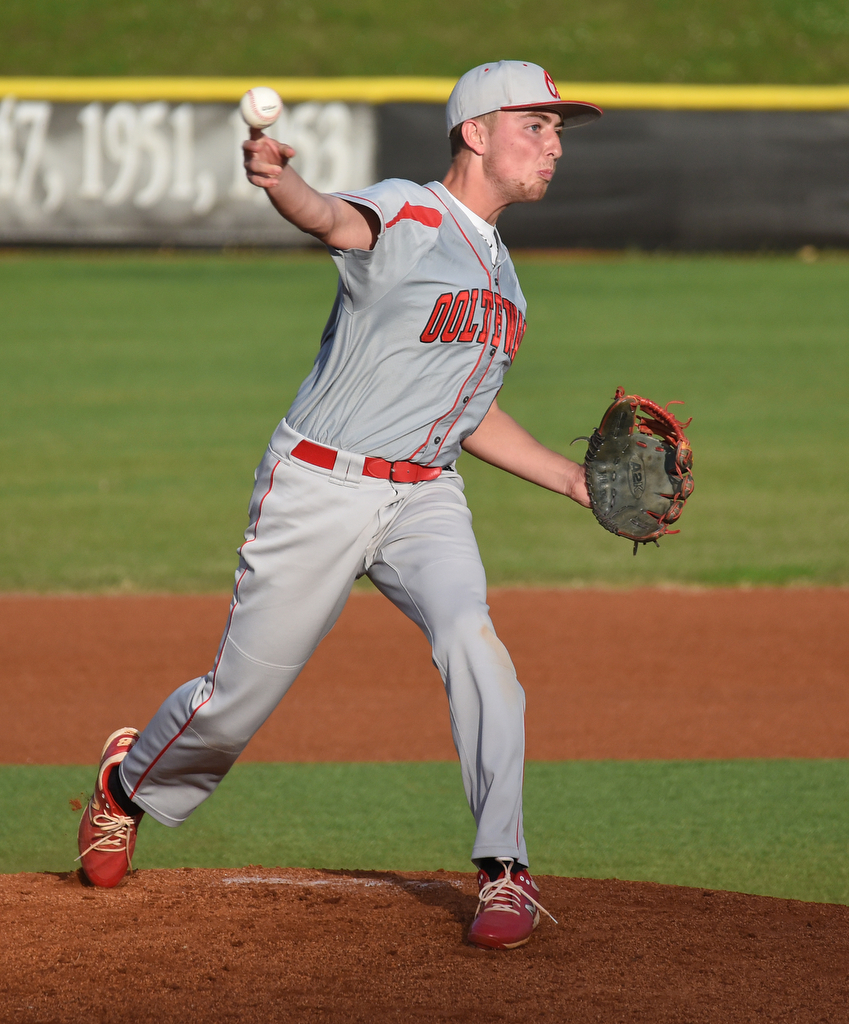 Staff Photo by Matt Hamilton / Ooltewah (6) Eli Smith keeps the runner at first honest with a throw to first on Friday, April 30, 2021 at the McCallie School.