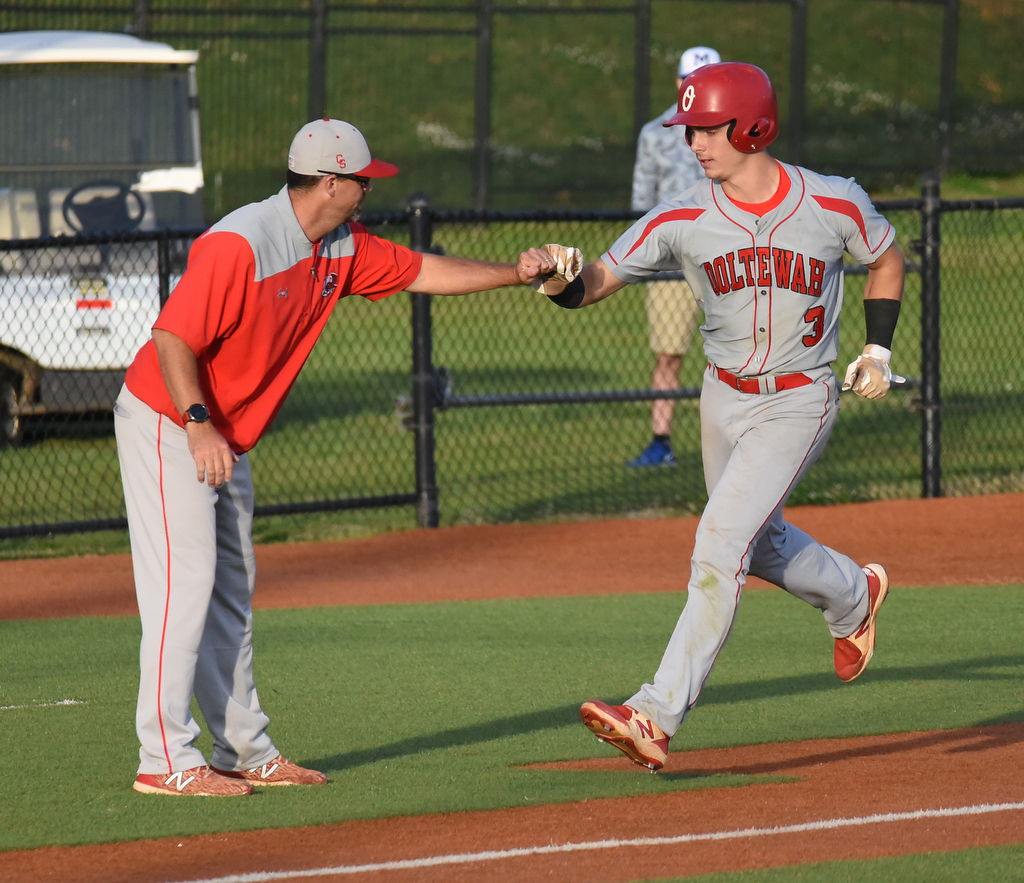 Staff photo by Matt Hamilton / Ooltewah's Fisher Perry rounds third after hitting a home run during Friday's game at McCallie.
