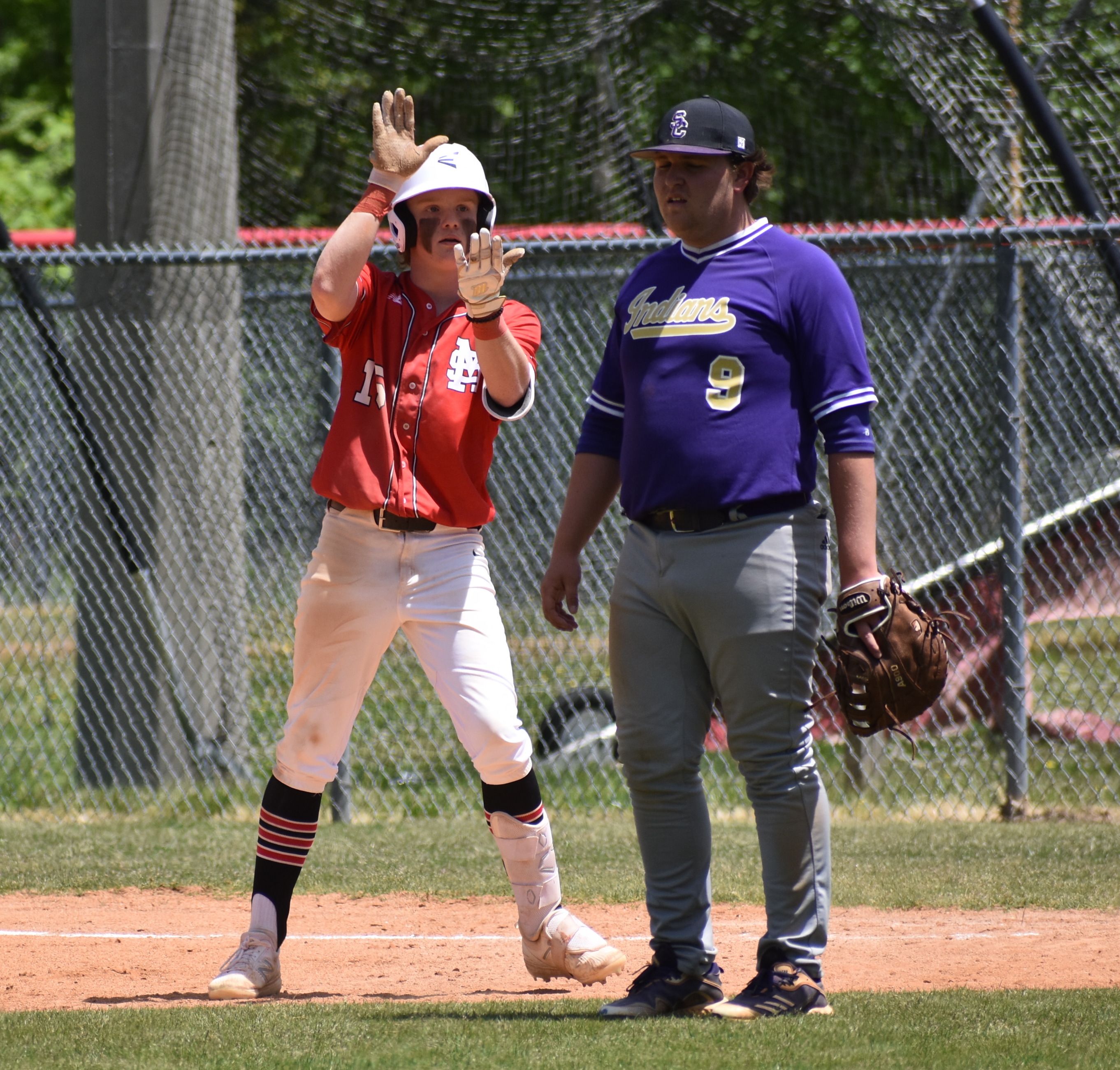 Staff photo by Patrick MacCoon / Signal Mountain's Carter Giles celebrates after his RBI single in the fifth inning during Saturday's 6-4 home victory over Sequatchie County.