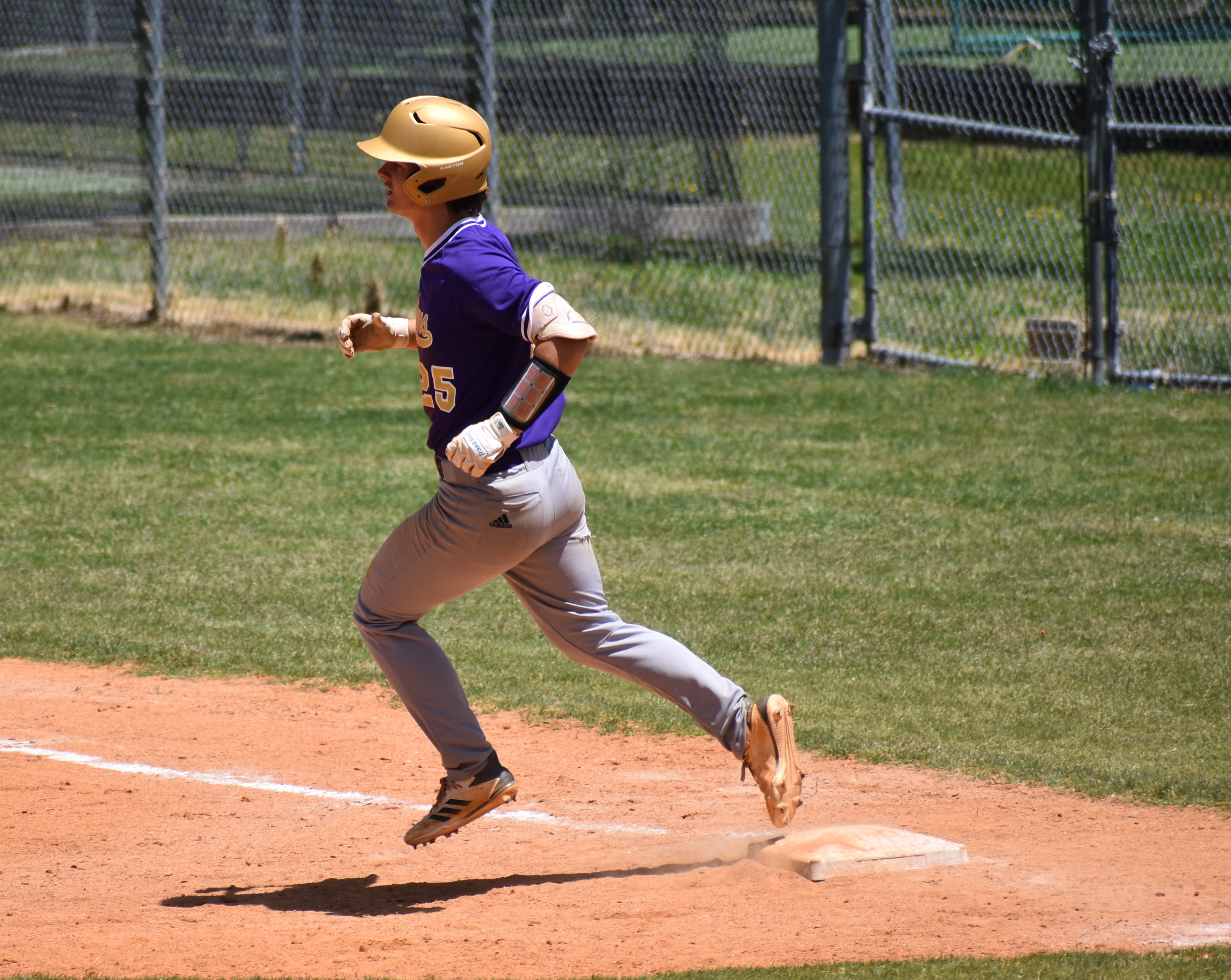 Staff photo by Patrick MacCoon / Sequatchie County senior Griffin Hall rounds first base after his second hit of Saturday's contest against Signal Mountain.