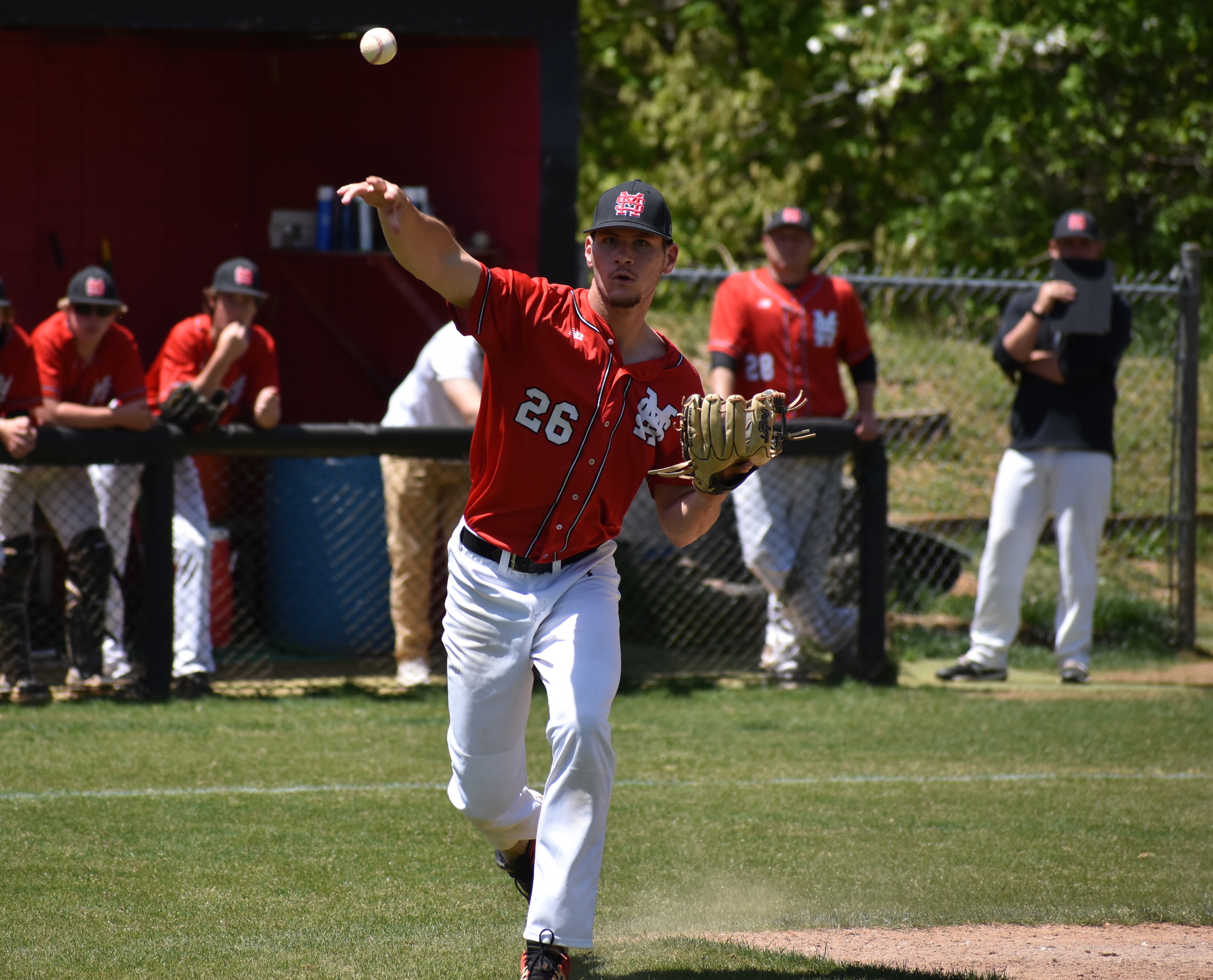 Staff photo by Patrick MacCoon / Signal Mountain senior Braeden Wolfard makes a throw to first during Saturday's 6-4 home victory over Sequatchie County.