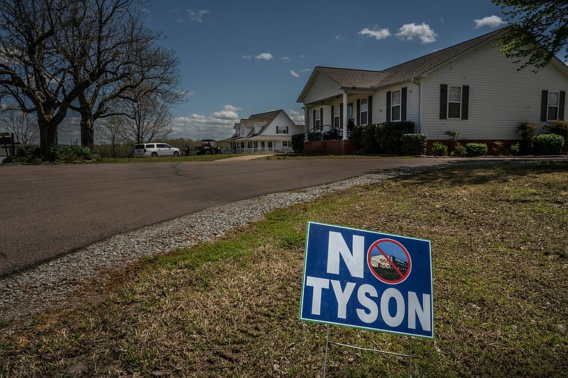 A 'No Tyson' sign is on the street where Taylor and other farmers live who are leery of Tyson. (Photo: John Partipilo)