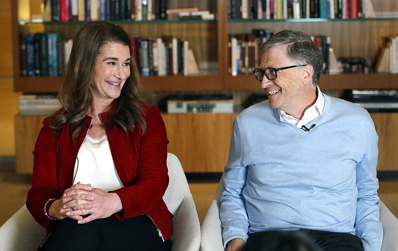 In this Feb. 1, 2019, file photo, Bill and Melinda Gates smile at each other during an interview in Kirkland, Wash. The couple announced Monday, May 3, 2021, that they are divorcing. The Microsoft co-founder and his wife, with whom he launched the world's largest charitable foundation, said they would continue to work together at The Bill & Melinda Gates Foundation. (AP Photo/Elaine Thompson, File)