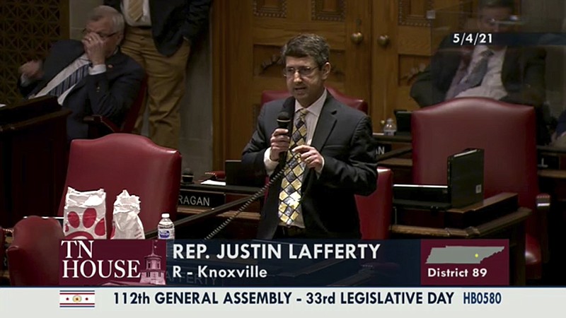 In this still image from video provided by the Tennessee General Assembly, Rep. Justin Lafferty, R-Knoxville, speaks on the floor of the House of Representatives at the State Capitol in Nashville, Tenn., on Tuesday, May 4, 2021. Lafferty falsely declared that an 18th century policy designating a slave as three-fifths of a person was adopted for "the purpose of ending slavery," commenting amid a debate over whether educators should be restricted while teaching about systematic racism in America. (Tennessee General Assembly via AP)