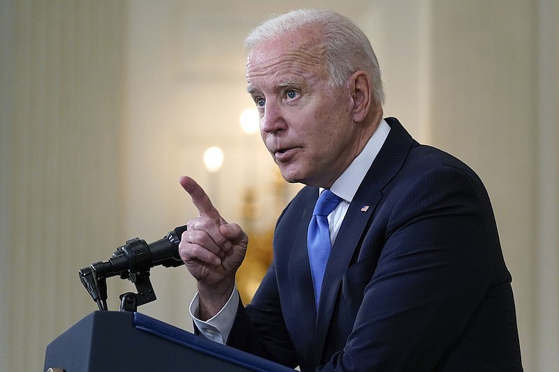 President Joe Biden gesturing as he takes questions from reporters as he speaks about the American Rescue Plan, in the State Dining Room of the White House, Wednesday, May 5, 2021, in Washington. (AP Photo/Evan Vucci)