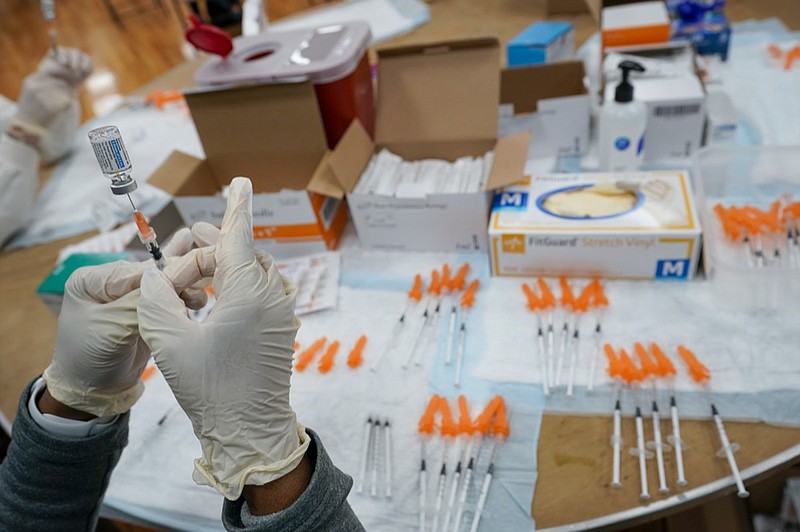 FILE - In this April 8, 2021, file photo, a Northwell Health registered nurses fills a syringe with the Johnson & Johnson COVID-19 vaccine at a pop up vaccination site at the Albanian Islamic Cultural Center in the Staten Island borough of New York. (AP Photo/Mary Altaffer, File)


