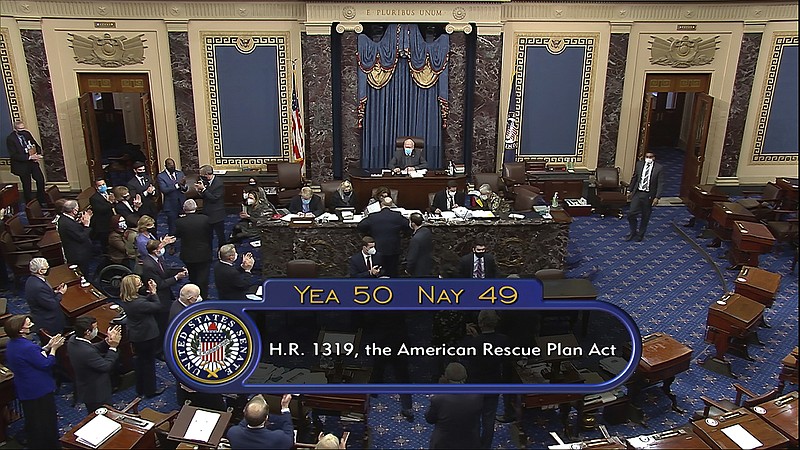 Senate Television photo via AP / In this image from video, the vote total of 50-49 on Senate passage of the COVID-19 relief bill, is displayed on screen in the Senate at the U.S. Capitol in Washington on March 6, 2021. Not one Republican voted for the relief.