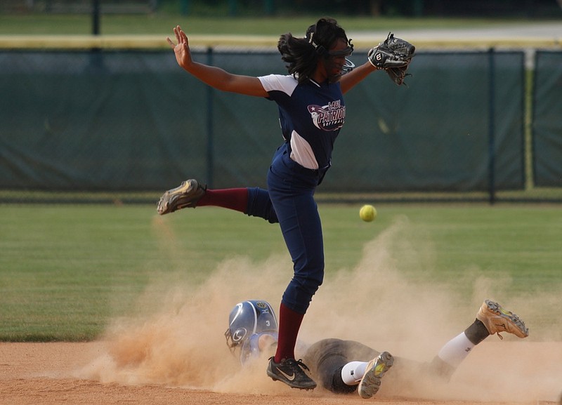 Staff photo / Sale Creek's Allison Smith slides into second base as a throw goes wide past Arts & Sciences shortstop Jade Hester during a high school softball game at Chattanooga's Warner Park on April 30, 2019.