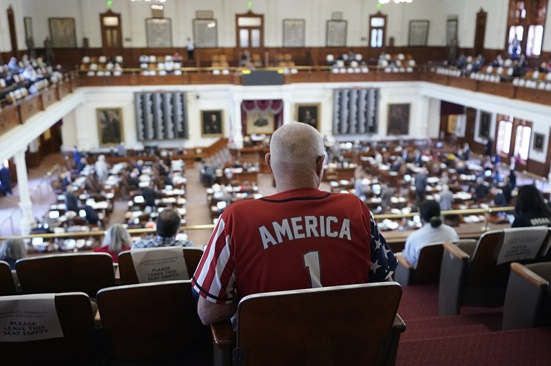 Gerald Welty sits the House Chamber at the Texas Capitol as he waits to hear debate on voter legislation in Austin, Texas, Thursday, May 6, 2021. (AP Photo/Eric Gay)


