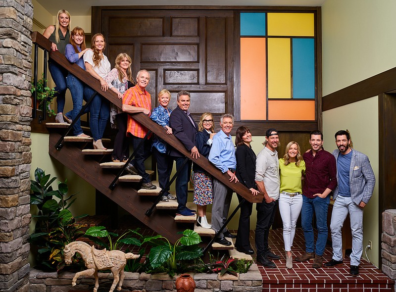 TNS Photo / The former child stars of "The Brady Bunch" and home renovation experts from HGTV stand on the signature stairway from the late '60s-early '70s sitcom. A Chattanooga-based casting agent is seeking a house with a similar vibe to be used in a locally produced commercial.