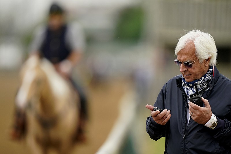 AP file photo by Charlie Riedel / Bob Baffert, right, who trains Kentucky Derby winner Medina Spirit, was adamant Sunday in denying any wrongdoing after it was revealed the horse failed a drug test after the May 1 race.
