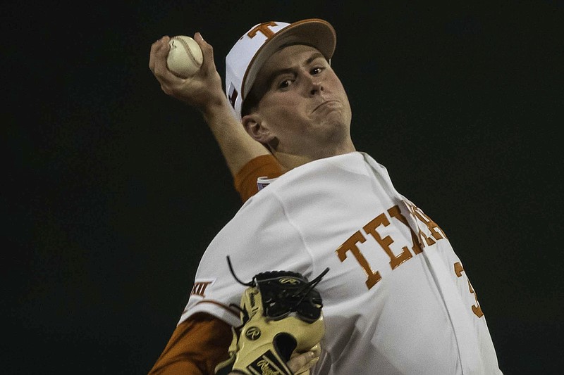 FILE - Texas' Pete Hansen pitches against Sam Houston State during a college baseball game in Austin, Texas, in this Tuesday, Feb. 25, 2020, file photo. The Texas Longhorns found a way to cool down TCU and make sure the Big 12 Conference race goes down to the final weekend. Texas won 5-4 and lost 2-1 in the first two games.  Then came the finale when Zach Zubia had two homers and drove in four runs and Pete Hansen delivered another dominant start. (Lola Gomez/Austin American-Statesman via AP, File)