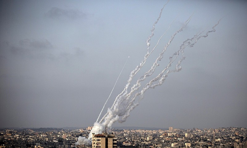 Rockets are launched from the Gaza Strip towards Israel, Monday, May. 10, 2021. (AP Photo/Khalil Hamra)