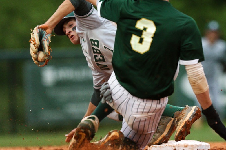 Staff photo by Troy Stolt / Webb short stop Jackson Musrock (1) tags out Silverdale's Owen Phillips (3) at second base during the Division II state baseball tournament game between Webb high school and Silverdale Baptist Academy on Monday, May 10, 2021 in Chattanooga, Tenn.